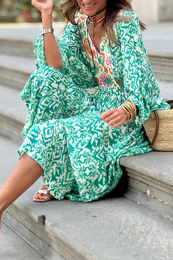 Vestido largo con cuello en V y estampado de tótem verde de Ledell