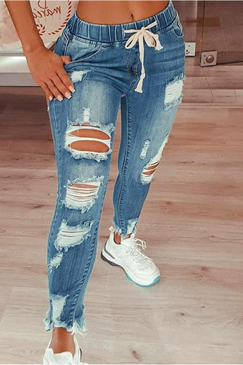 Vaqueros de cintura media rasgados, casuales y de moda
