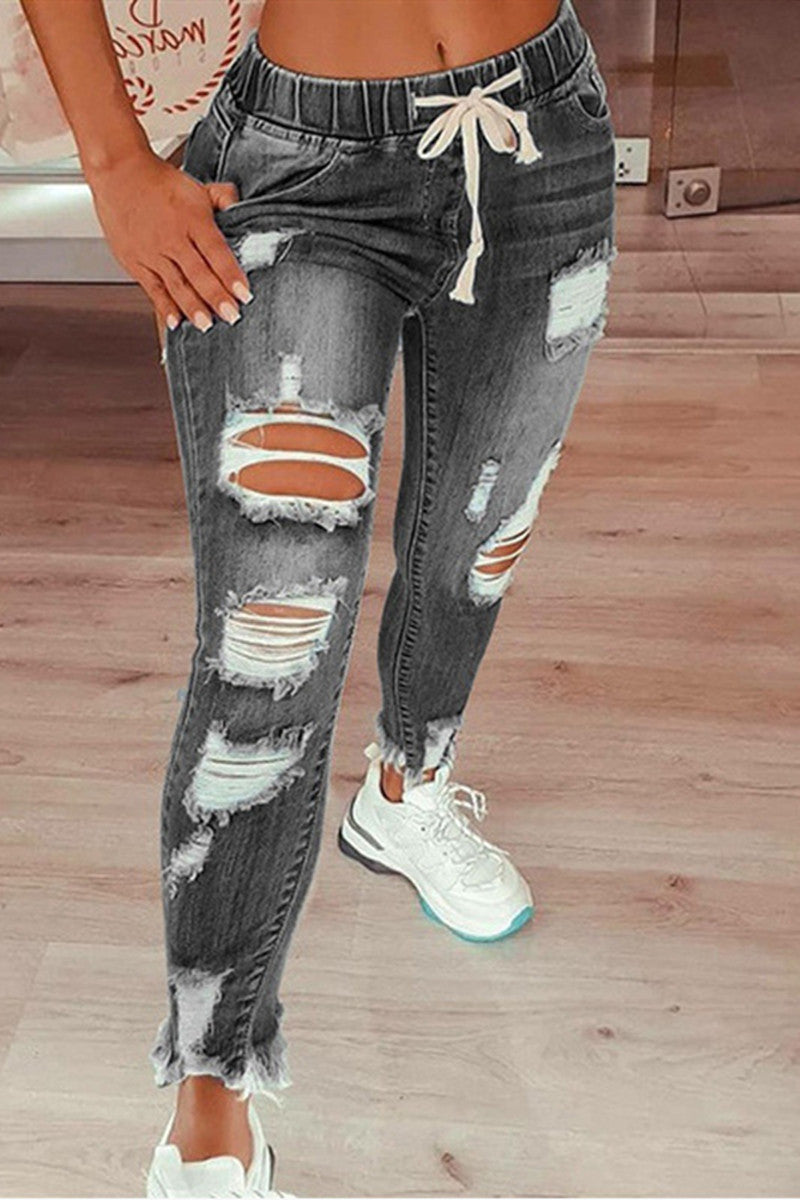 Vaqueros de cintura media rasgados, casuales y de moda