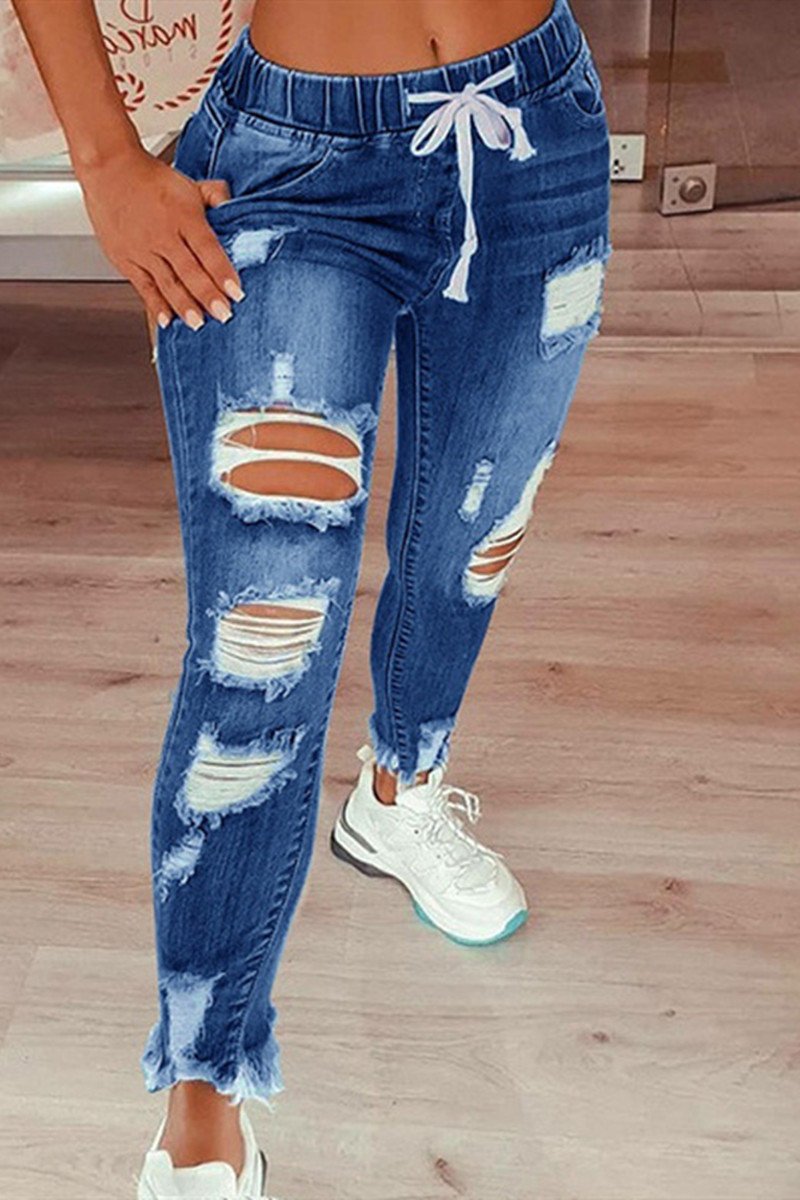 Vaqueros de cintura media rasgados, casuales y de moda