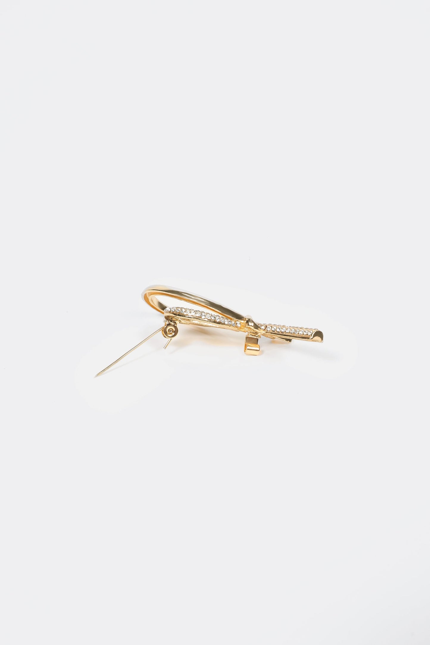 Broche de metal irregular