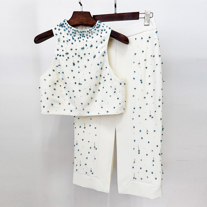Conjunto de dos piezas con chaleco y falda dividida y cuentas de Heavy Industry