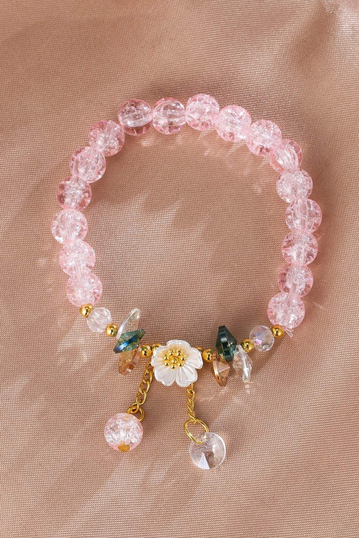 Pulsera de cuentas de vidrio de colores con diseño floral