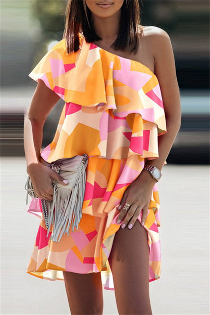 Vestido informal de moda con estampado de patchwork, sin espalda, cuello oblicuo, sin mangas