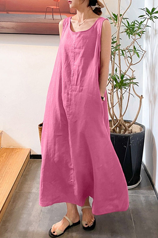 Vestido informal sencillo, liso, con bolsillos, cuello redondo y sin mangas.