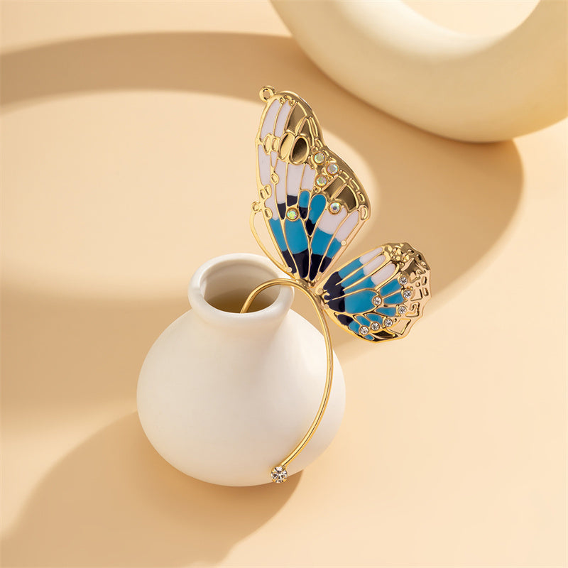 Pendientes casuales de mariposa con parches de diamantes de imitación