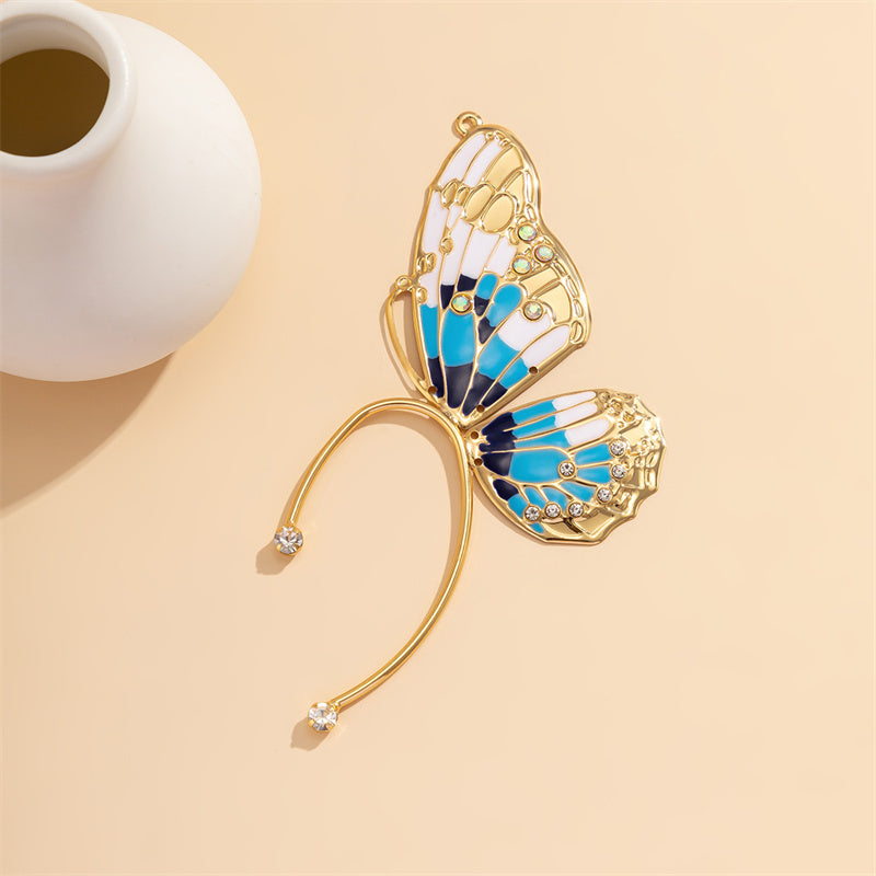 Pendientes casuales de mariposa con parches de diamantes de imitación
