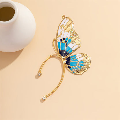 Pendientes casuales de mariposa con parches de diamantes de imitación