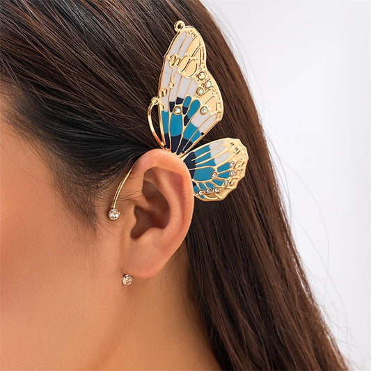 Pendientes casuales de mariposa con parches de diamantes de imitación