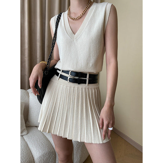 Traje de dos piezas con falda plisada y chaleco de punto de alta calidad de otoño a la moda